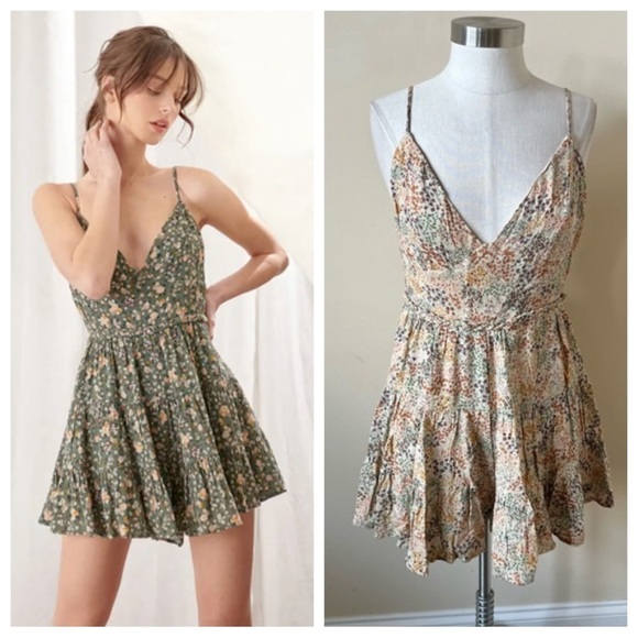 Storia Dresses & Skirts - Storia floral Bow Tie Back Mini dress 17792